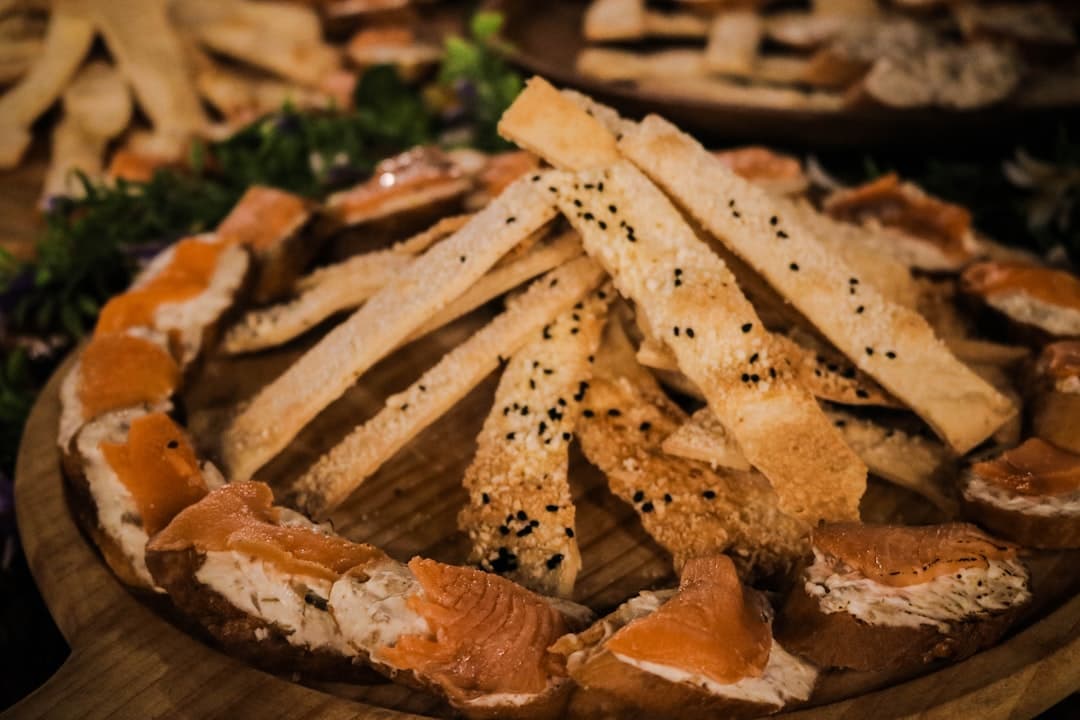 brown food on brown wooden table — Photo by JL Magata on Unsplash